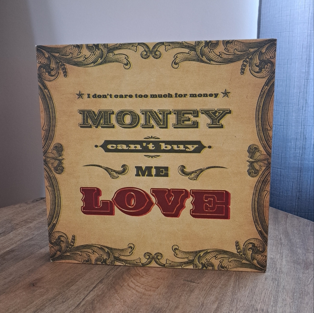 Wall Wooden Decor Sign with Quote "Money Can't Buy Me Love"